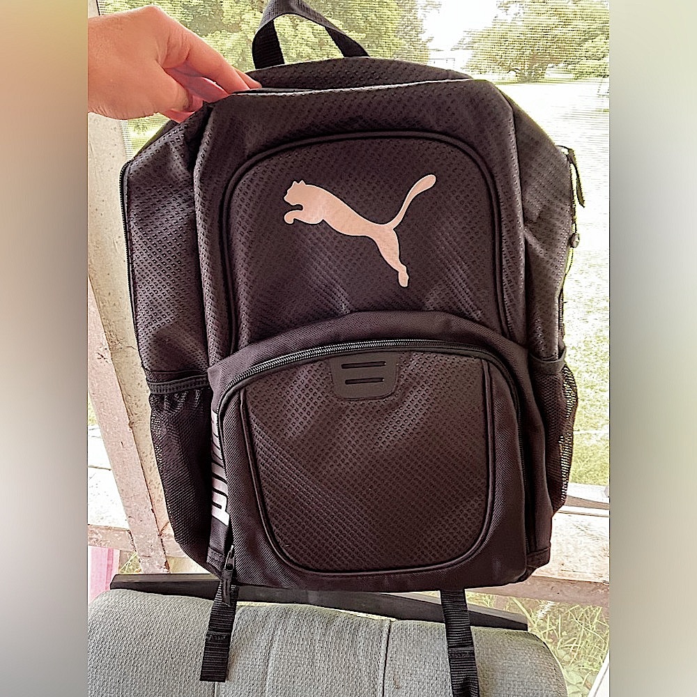 Puma backpack. Never used. Perfect condition. Black.